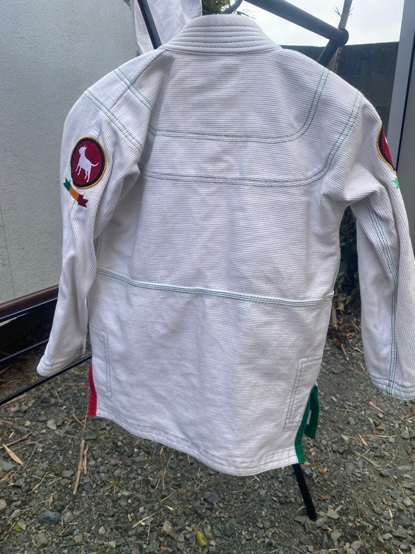 Kids' Jiu Jitsu Gi M1 One stain near the lower left abdomen (photo included)